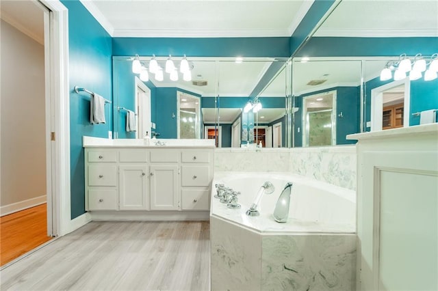 bathroom with vanity, crown molding, a relaxing tiled tub, beamed ceiling, and wood-type flooring