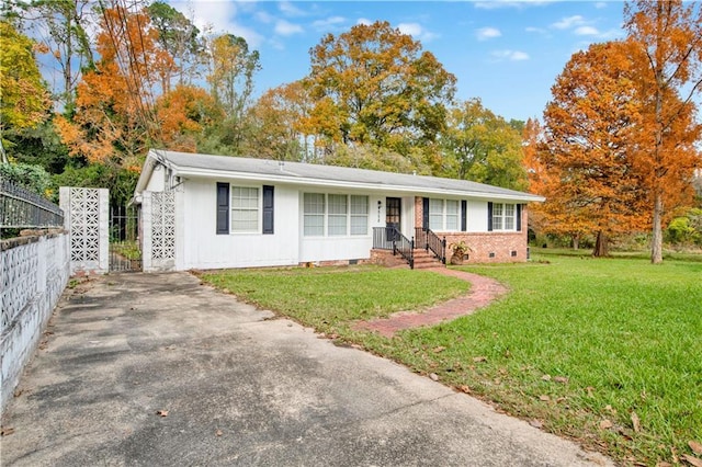 ranch-style house with a front yard