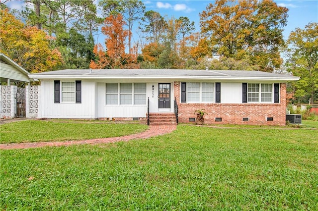 single story home with central AC and a front lawn