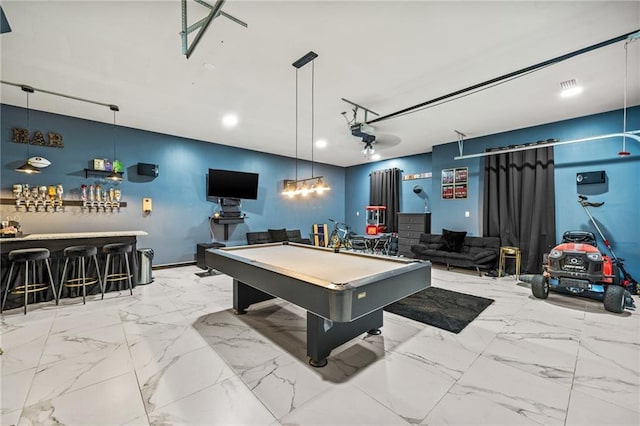 recreation room featuring indoor bar