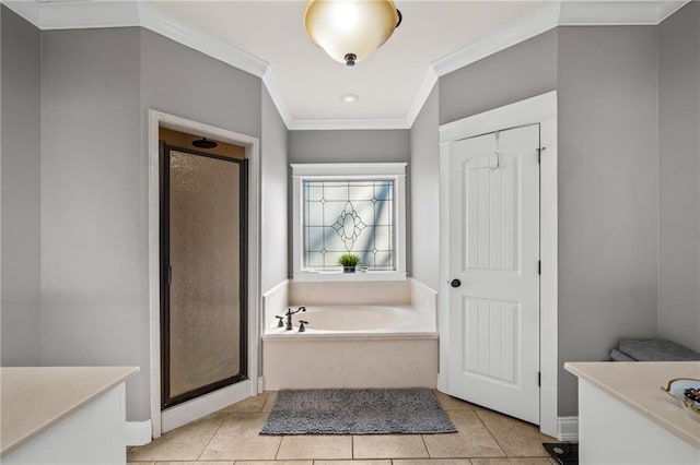 bathroom featuring tile patterned flooring, ornamental molding, separate shower and tub, and vanity