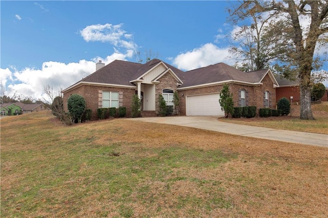 single story home featuring a garage and a front lawn