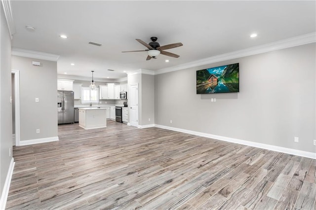 unfurnished living room with crown molding, light hardwood / wood-style flooring, and ceiling fan