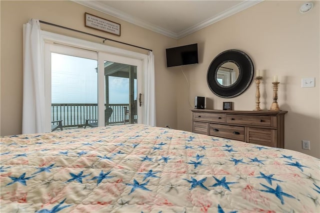 bedroom featuring crown molding and access to outside