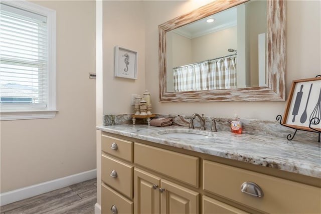 bathroom with vanity and wood-type flooring