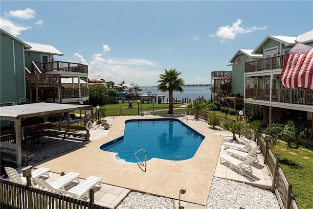 528 Lemoyne Dr Unit 2C, Dauphin Island, AL 36528 - community pool featuring a water view and a patio area