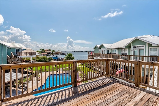 528 Lemoyne Dr Unit 2C, Dauphin Island, AL 36528 - wooden terrace with a water view