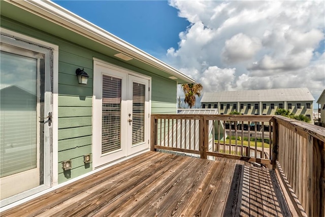 528 Lemoyne Dr Unit 2C, Dauphin Island, AL 36528 - wooden deck with french doors