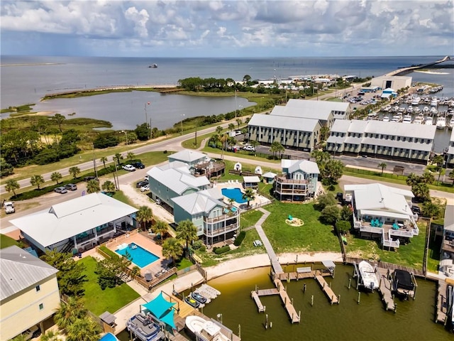 528 Lemoyne Dr Unit 2C, Dauphin Island, AL 36528 - drone / aerial view of a nearby body of water and a pool area