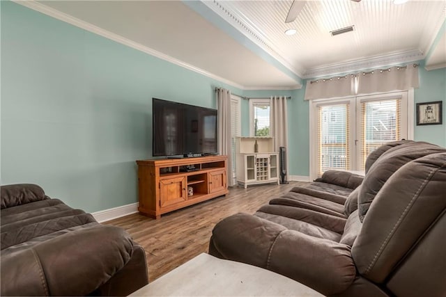 528 Lemoyne Dr Unit 2C, Dauphin Island, AL 36528 - living room featuring crown molding, a ceiling fan, and wood finished floors