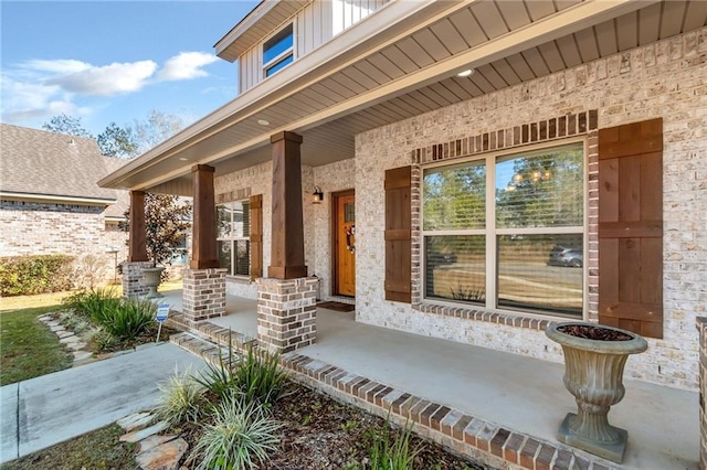 property entrance with covered porch