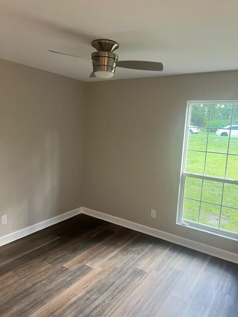 unfurnished room featuring wood-type flooring and ceiling fan