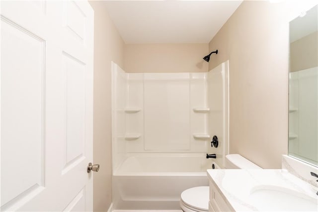 bathroom featuring vanity, toilet, and shower / bath combination