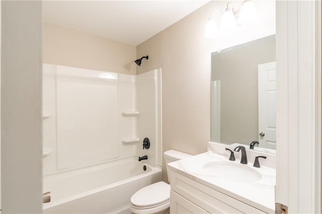 bathroom featuring shower / bathtub combination, toilet, and vanity