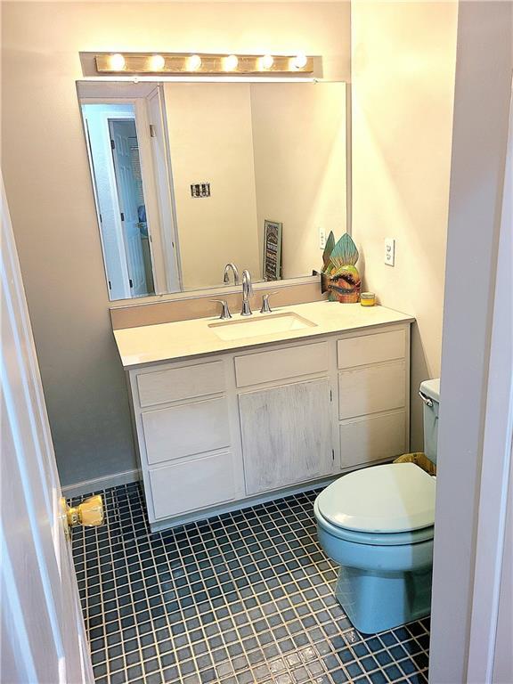 half bath with toilet and vanity