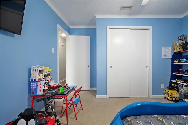 1120 Abilene Dr W, Mobile, AL 36695 - carpeted bedroom with crown molding, a closet, and ceiling fan