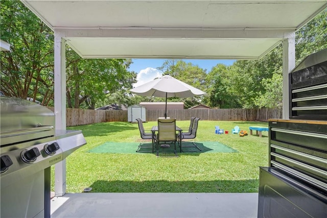 1120 Abilene Dr W, Mobile, AL 36695 - fenced backyard with a shed and a patio