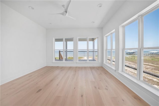 2626 Bridgeview Dr, Dauphin Island, AL 36528 - unfurnished sunroom with a water view