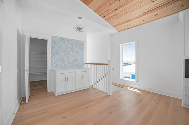 2626 Bridgeview Dr, Dauphin Island, AL 36528 - unfurnished room with wooden ceiling, vaulted ceiling, and light wood-style floors