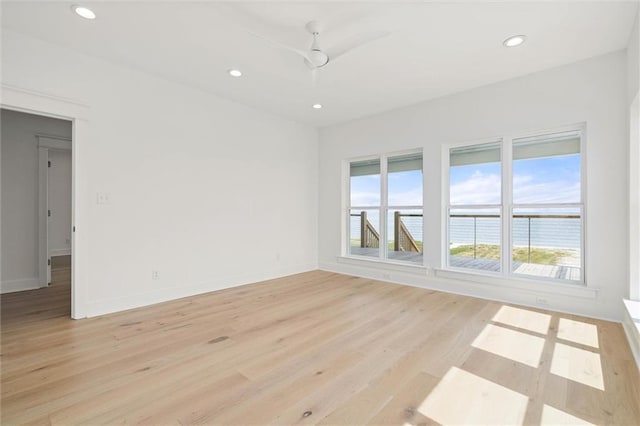 2626 Bridgeview Dr, Dauphin Island, AL 36528 - empty room featuring light wood-style flooring, recessed lighting, and ceiling fan