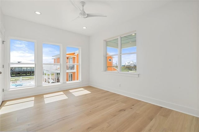 2626 Bridgeview Dr, Dauphin Island, AL 36528 - empty room featuring light wood finished floors, ceiling fan, and recessed lighting