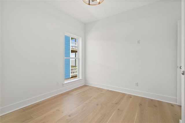 2626 Bridgeview Dr, Dauphin Island, AL 36528 - spare room with baseboards and light wood-type flooring