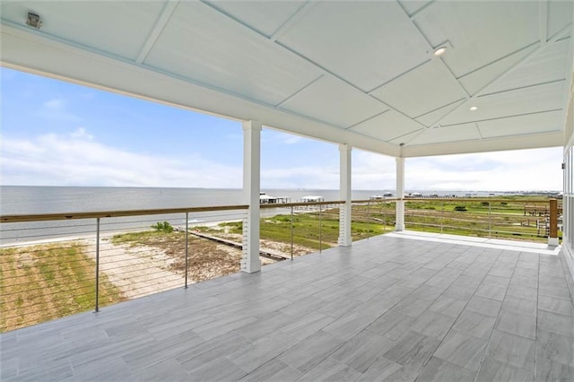 2626 Bridgeview Dr, Dauphin Island, AL 36528 - wooden terrace featuring a water view and a carport