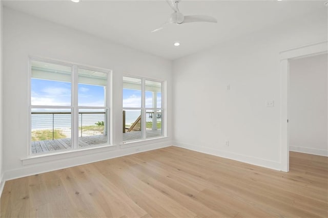 2626 Bridgeview Dr, Dauphin Island, AL 36528 - unfurnished room featuring light wood-style flooring, ceiling fan, and recessed lighting