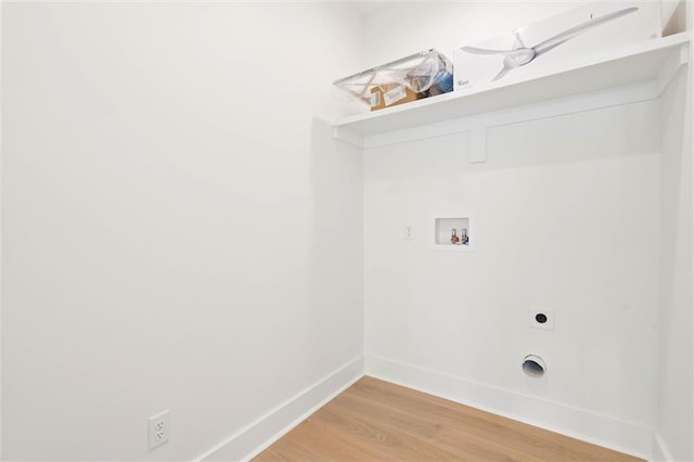 2626 Bridgeview Dr, Dauphin Island, AL 36528 - laundry room with light wood-type flooring, hookup for a washing machine, and hookup for an electric dryer