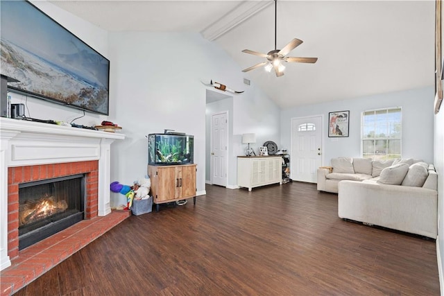 living room with dark hardwood / wood-style flooring, a brick fireplace, ceiling fan, high vaulted ceiling, and beamed ceiling