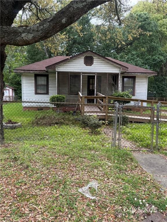 557 Kent St, Mobile, AL 36617 - view of front of house featuring a porch and a gate