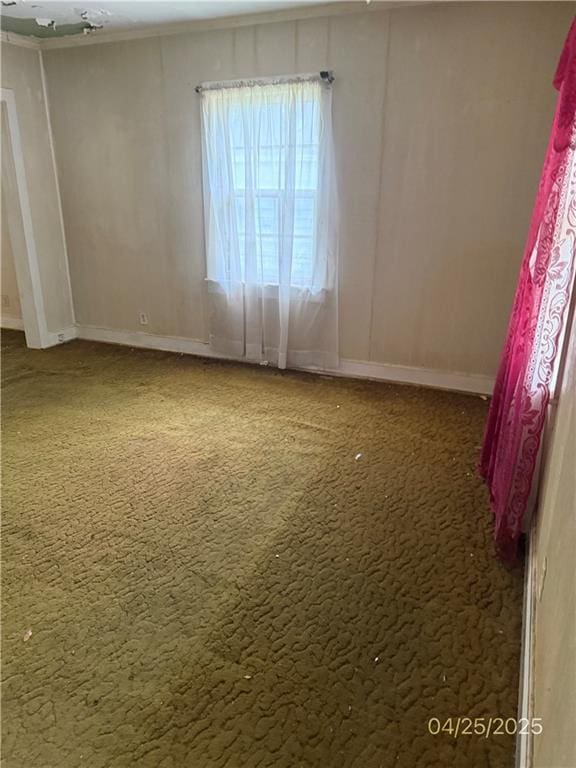 557 Kent St, Mobile, AL 36617 - empty room featuring carpet flooring and baseboards