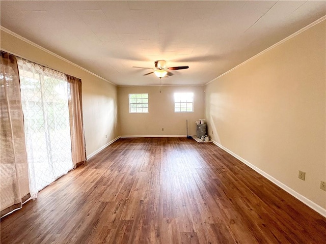 unfurnished room featuring ceiling fan, ornamental molding, and hardwood / wood-style floors