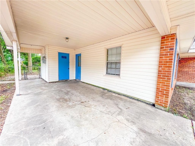 2602 Eldorado Dr, Mobile, AL 36605 - view of patio featuring an attached carport