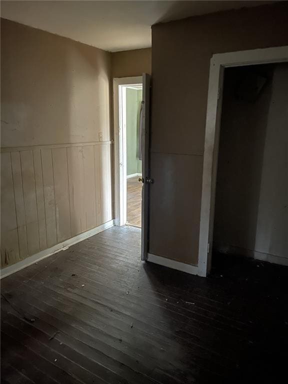 empty room featuring dark hardwood / wood-style floors