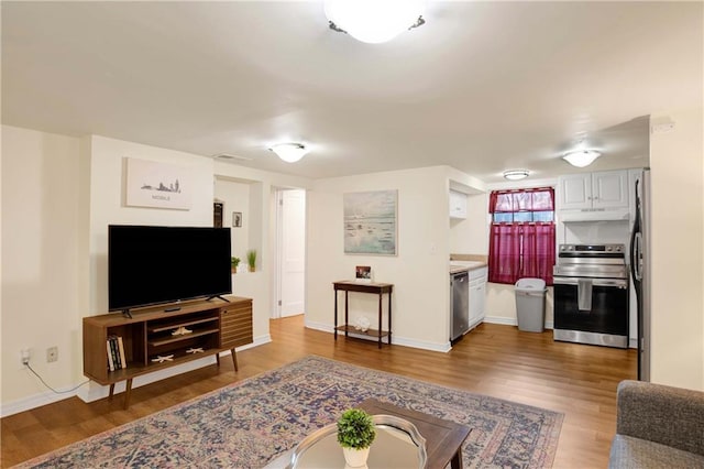 living room featuring dark hardwood / wood-style flooring