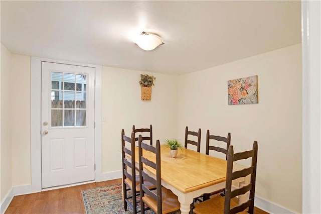 dining area featuring hardwood / wood-style flooring