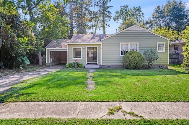 ranch-style house with a front yard