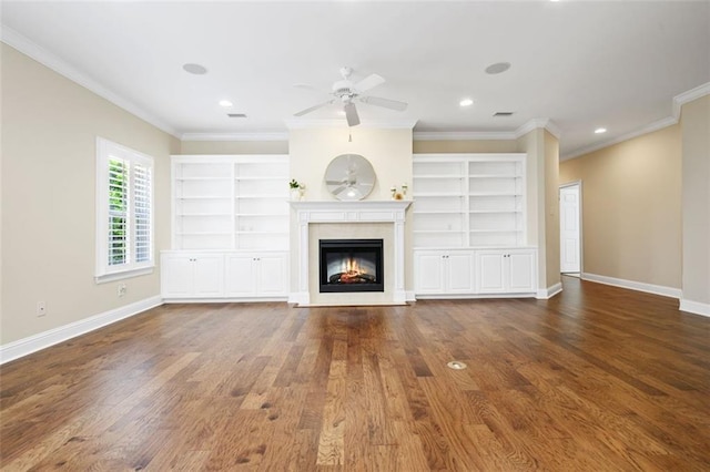 6645 Somerby Ln, Mobile, AL 36695 - unfurnished living room featuring baseboards, a glass covered fireplace, ceiling fan, ornamental molding, and wood finished floors