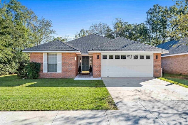 ranch-style house featuring concrete driveway, brick siding, an attached garage, and a front lawn