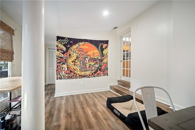 sitting room with hardwood / wood-style flooring