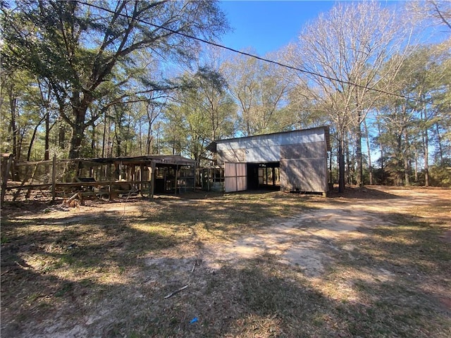 exterior space with an outbuilding and an outdoor structure