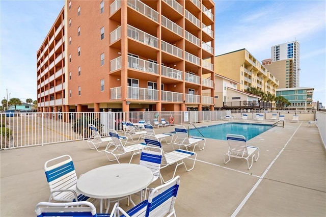 633 Beach Blvd Unit 205, Gulf Shores, AL 36542 - community pool with fence and a patio