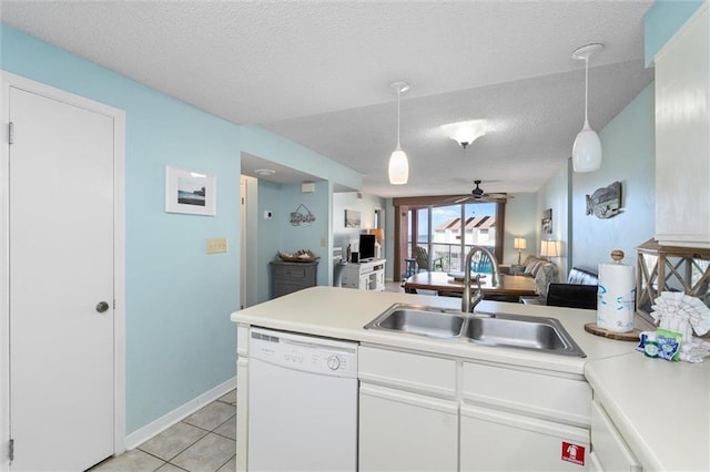 633 Beach Blvd Unit 205, Gulf Shores, AL 36542 - kitchen featuring white dishwasher, a sink, a textured ceiling, open floor plan, and a ceiling fan