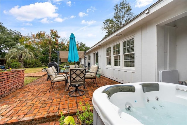 view of patio featuring a hot tub