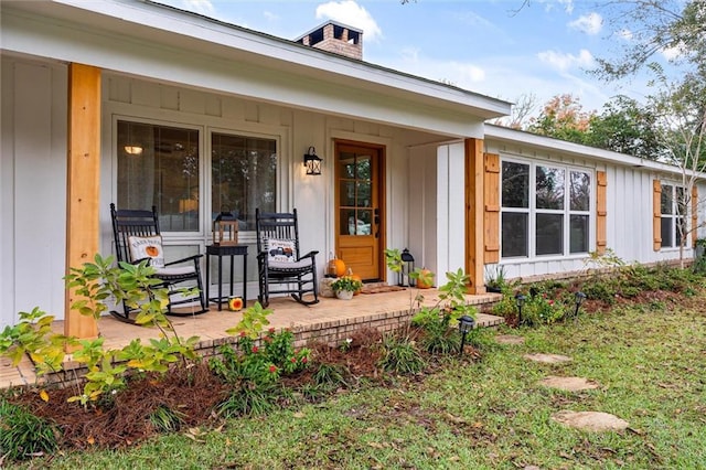 property entrance featuring covered porch