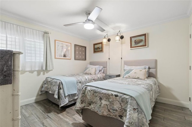 1051 Beach Blvd W Unit 9B, Gulf Shores, AL 36542 - bedroom featuring crown molding, wood finished floors, and a ceiling fan