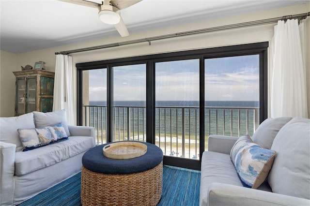 1051 Beach Blvd W Unit 9B, Gulf Shores, AL 36542 - living area featuring a water view and ceiling fan