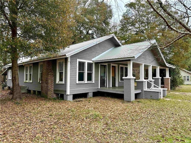 view of home's exterior with covered porch