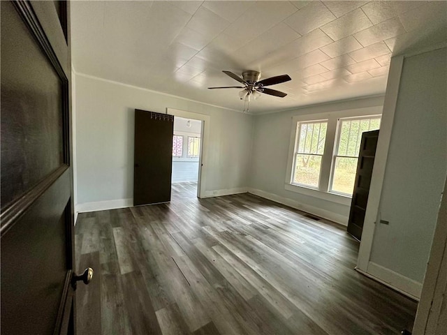 unfurnished bedroom featuring ceiling fan and wood-type flooring